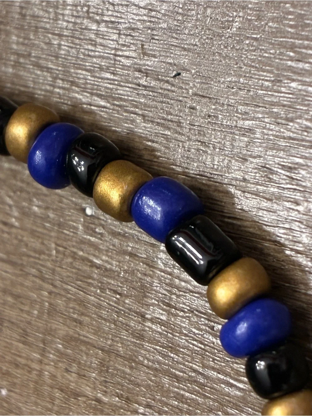 Handmade Blue, Black & Gold Beaded Bracelet with Heart Accent